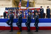 Honor Guard members of Minot Air Force base present colors during a change of command ceremony, June 23, 2022, at Minot Air Force Base, North Dakota. The vision of the USAF Honor Guard is to ensure a legacy of Airmen who: promote the mission; protect the standards; perfect the image; and preserve the heritage. (U.S. Air Force photo by Airman 1st class Alexander Nottingham)