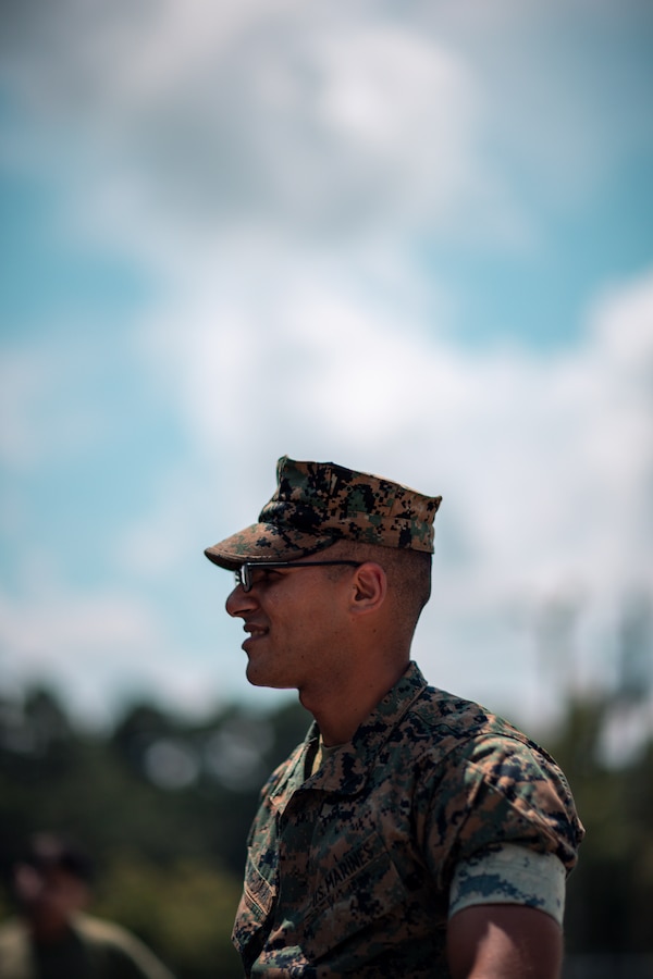 U.S. Marine Corps Lance Cpl. Hasanein Alrushdawi a motor transport operator with Marine Wing Support Squadron (MWSS) 273, 2d Marine Aircraft Wing (MAW), looks on at Marine Corps Air Station Beaufort, South Carolina, Aug. 17, 2023. Alrushdawi, an Orlando, Florida and Bagdad, Iraq native, joined the Marine Corps after being inspired by the work his father did as an interpreter alongside U.S. forces in Iraq during Operation Iraqi Freedom. MWSS 273 is a subordinate command of 2d MAW, the aviation combat element of II Marine Expeditionary Force. (U.S. Marine Corps photo by Warrant Officer Akeel Austin)