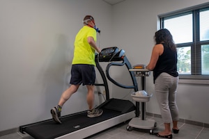 JOINT BASE LANGLEY-EUSTIS, Va. – David Pittman, U.S. Army Training and Doctrine Command Headquarters personnel, runs on a treadmill while being monitored by Samantha Melius, Armed Forces Wellness Center supervisory health educator, at the Armed Forces Wellness Center, at Joint Base Langley-Eustis, Virginia, Sept. 7, 2023. Pittman ran until he reached his desired heart rate so he can have the most accurate data to determine his appropriate training zone. (U.S. Air Force photo by Airman 1st Class Adisen Smith)