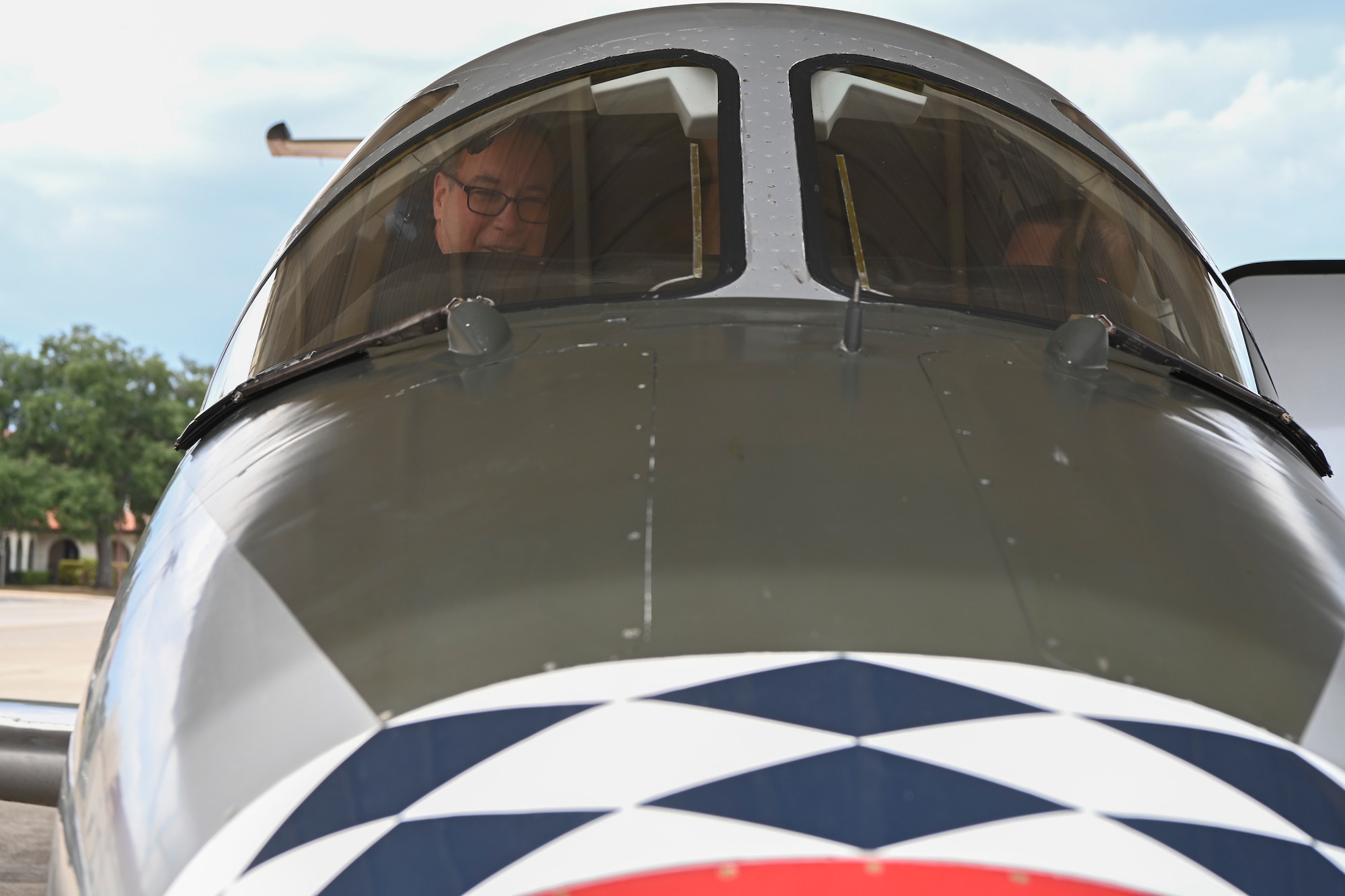 Thomas Palermo, 6th Maintenance Squadron honorary commander, sits in the cockpit of a T-1 Jayhawk at the 99th Flying Training Squadron JBSA-Randolph, Texas, Sept. 27, 2023.