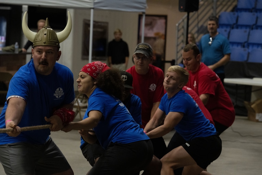 Members of Team Minot play a game of tug-of-war during the Norsk Hostfest Military Games in the city of Minot, North Dakota, Sept. 30, 2023. The Airmen competed for the coveted Hostfest trophy during the annual event.