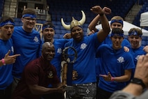Col. Kenneth McGhee, 91st Missile Wing commander, poses for a group photo with the winners of the Norsk Hostfest Military Games during Norsk Hostfest in the city of Minot, North Dakota, Sept. 30, 2023. The competition took place during the Military Appreciation Day portion of Norsk Hostfest.