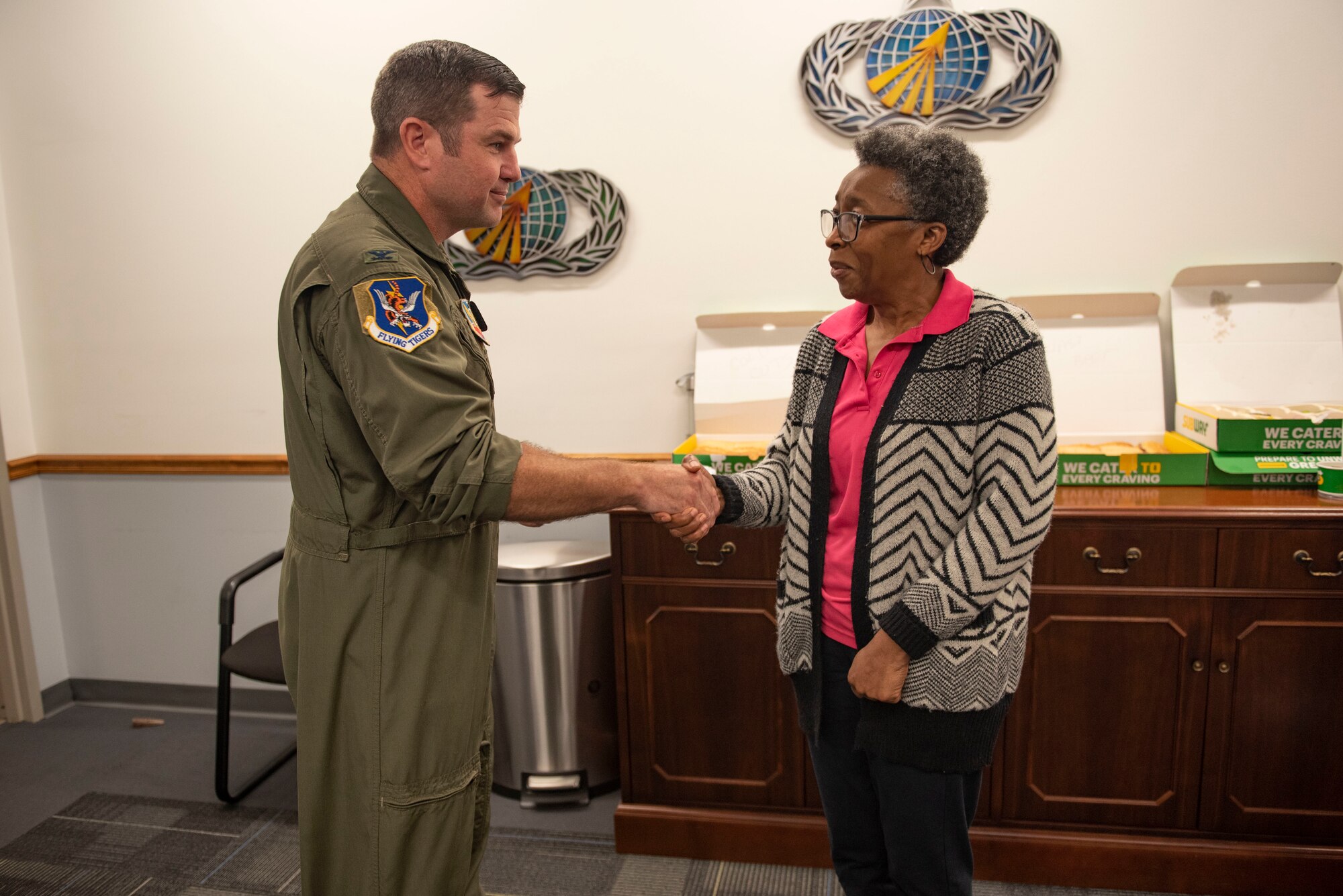 U.S. Air Force Col. Paul Sheets, 23rd Wing commander, recognizes a member of the 23rd Comptroller Squadron during a Red Carpet Organization Annual Closeout Appreciation meal at Moody Air Force Base, Georgia, Sept. 30, 2023. During the Red Carpet Organization Annual Close-out appreciation meal 23rd Wing leadership recognized Airmen and Department of Defense civilians for their hard work. (U.S. Air Force photo Staff Sgt. Thomas Johns)