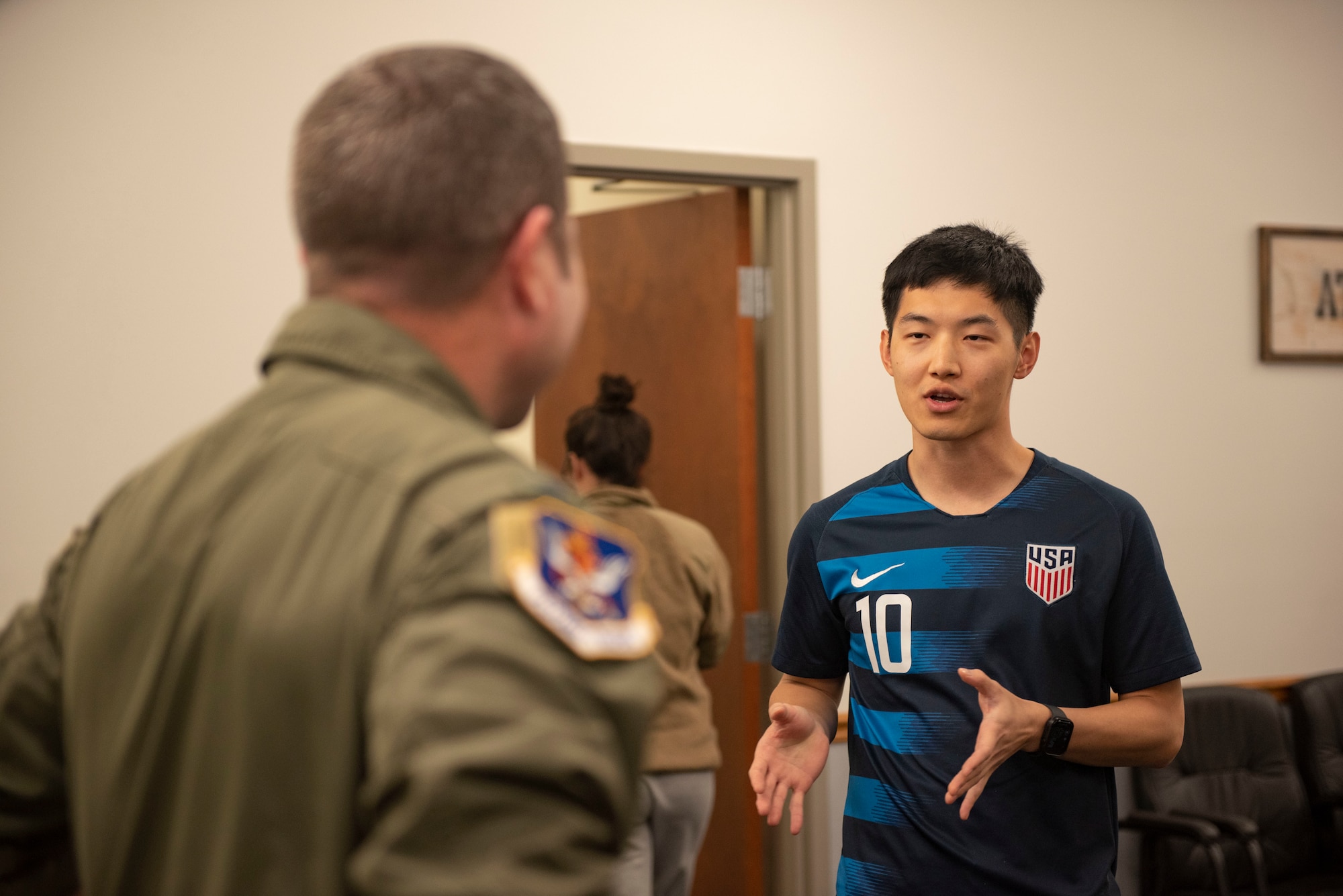 U.S. Air Force 1st Lt. Bryan Woo, 23rd Comptroller Squadron, speaks to Col. Paul Sheets, 23rd Wing commander, during a Red Carpet Committee annual closeout appreciation meal at Moody Air Force Base, Georgia, Sept. 30, 2023. Members from the 23rd Contracting Squadron and 23rd Comptroller Squadron worked into the night to ensure a successful budget closeout at midnight at the end of the fiscal year. (U.S. Air Force photo Staff Sgt. Thomas Johns)