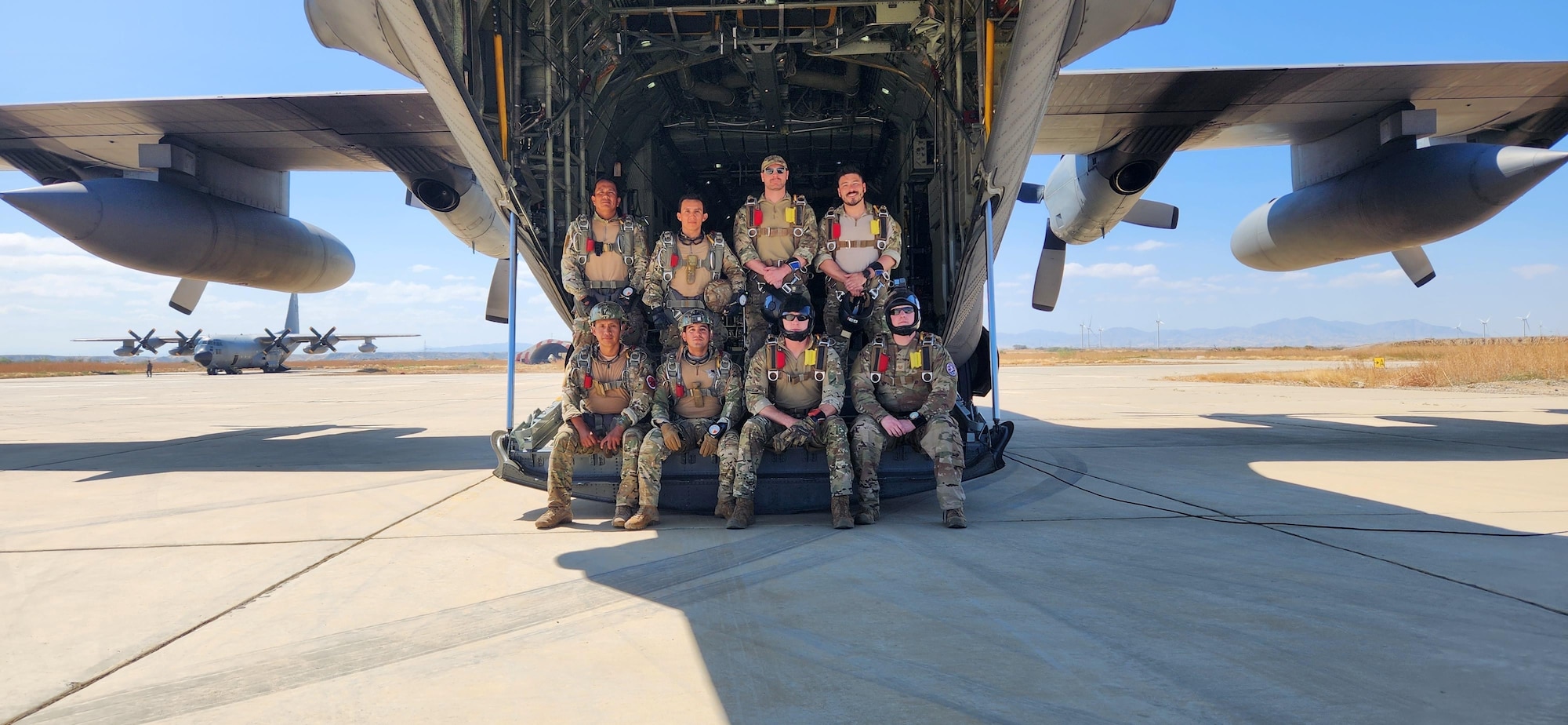 The 412th Operations Support Squadron from Edwards AFB takes a photo with Peruvian Armed Forces on a C-130 during the Resolute Sentinel 2023 exercise in July of 2023 in Peru. With a focus on combining combat training and civil-military operations, Resolute Sentinel 2023 serves as a vital platform to enhance cooperation between the U.S. and its partner nations.  (U.S. Air Force photo by 412th OSS)