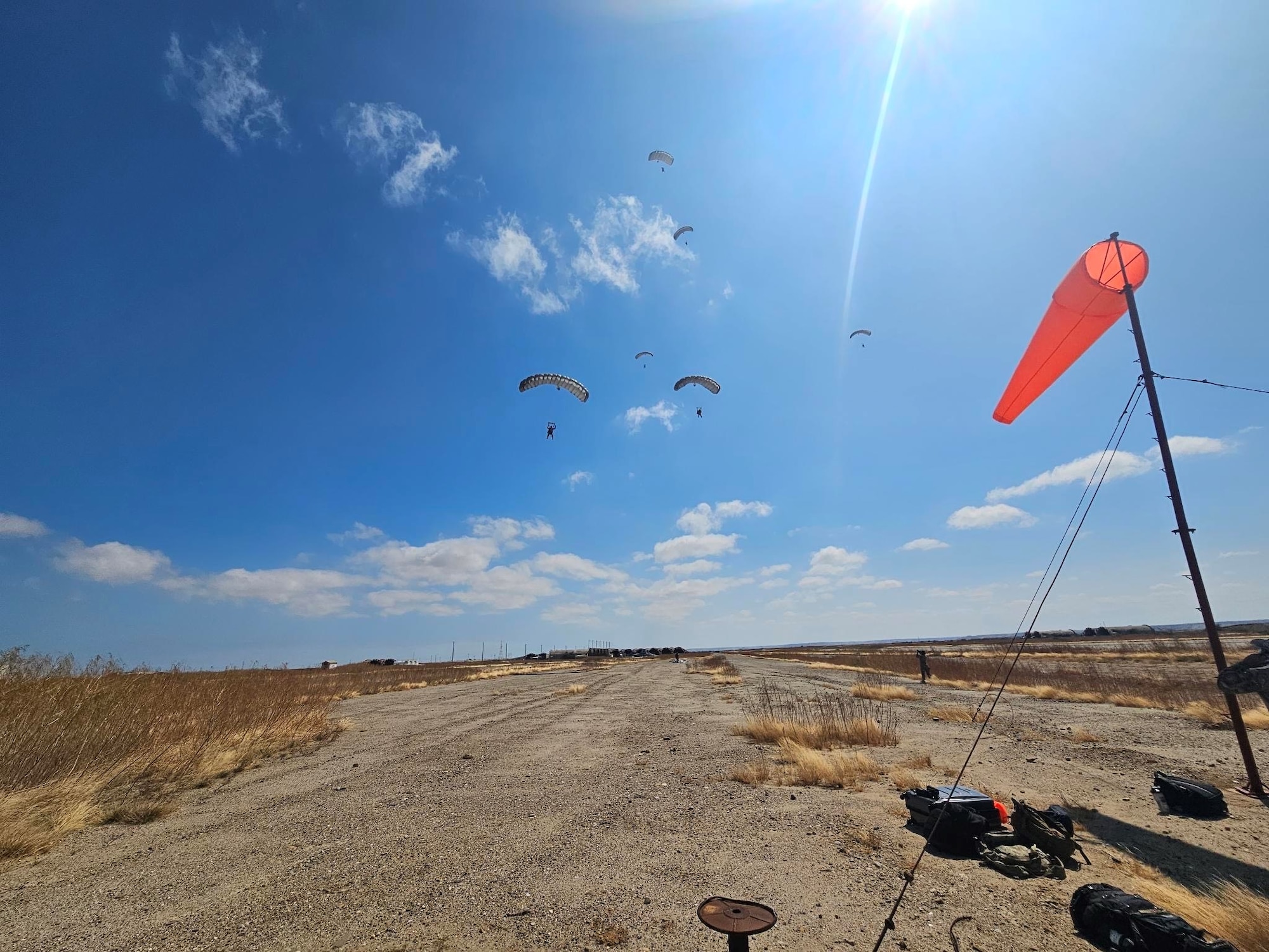 The 412th Operations Support Squadron Test Parachute Team from Edwards AFB conducts a military freefall jump in Peru during the Resolute Sentinel 2023 exercise alongside Peruvian Armed Forces in July of 2023. Edwards, known for its cutting-edge research and testing facilities, sent a specialized team of test parachutists to share their expertise and refine their skills alongside their Peruvian counterparts. (U.S. Air Force photo by 412th OSS)