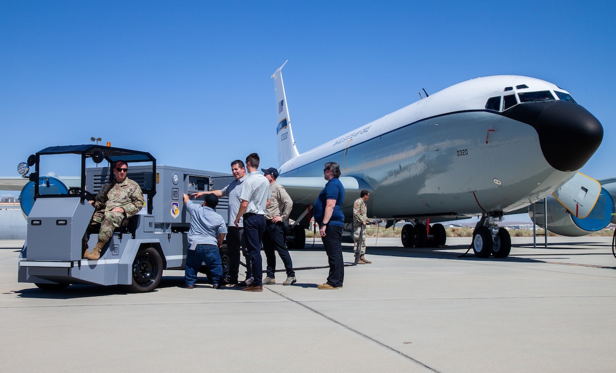 The Air Force Research Laboratory collaborated with the Air Force Life Cycle Management Center, Air Force Materiel Command, and General Motors Defense to power a KC-135 tanker aircraft with GM Defense’s Electric Ground Power Unit at Edwards Air Force Base, California, Aug. 14-17, 2023. To increase future energy agility, AFRL has teamed with its collaborators to build and test electric and hybrid flightline equipment and vehicles demonstrating many benefits relative to internal combustion engine-based platforms. (Courtesy photo / Carla Escamilla, 412th Public Affairs)