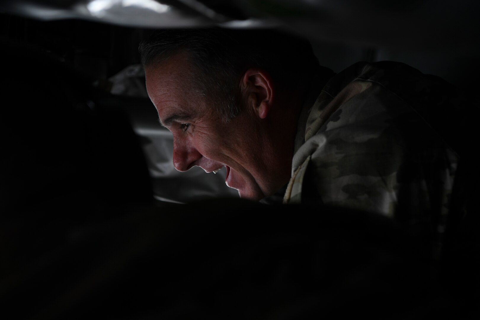 U.S. Air Force Chief Master Sgt Raun Howell, 6th Air Refueling Wing command chief, observes a KC-135 Stratotanker refueling a B-1 Lancer assigned to Dyess Air Force Base over Texas, Sept. 28, 2023.