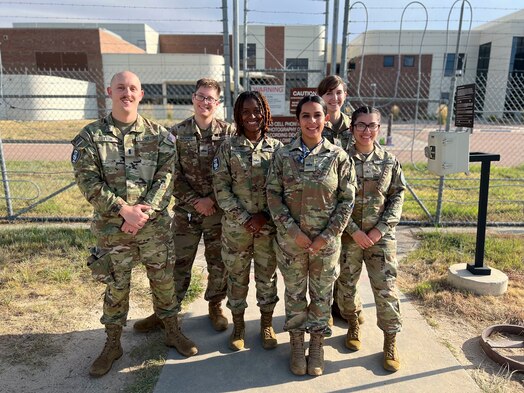  Members from the 16th Electromagnetic Warfare Squadron, 71st and 72d Intelligence, Surveillance, and Reconnaissance Squadrons, 428th Electromagnetic Warfare Flight, and 138th Space Control Squadron pose for a group photo during BLACK SKIES 23-3 at Peterson Space Force Base, Colorado, Sept. 13, 2023. Established in 2022, Space Training and Readiness Command's BLACK SKIES exercise series was conceived as the advanced training epic for tactical units to understand the intricacies of operational planning to tactical task. (Courtesy photo)