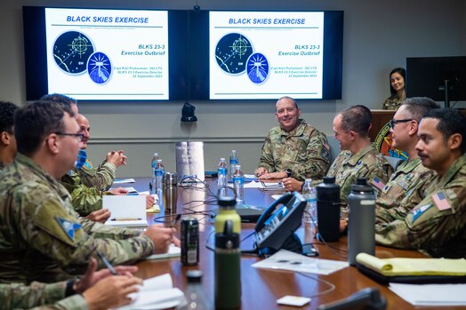  Maj. Gen. Douglas A. Schiess discusses lessons learned with BLACK SKIES participants and exercise planners at the Combined Force Space Component Command headquarters Sept. 22, 2023 at Vandenberg Space Force Base, Calif. Established in 2022, Space Training and Readiness Command's BLACK SKIES exercise series was conceived as the advanced training epic for tactical units to understand the intricacies of operational planning to tactical task. (Courtesy photo)