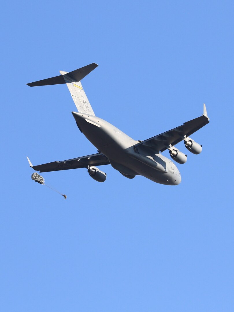 Nebraska Army National Guard infantryman Spc. Peter Kavan exits a C-17 Globemaster III after a static line jump Sept. 29, 2023, above Husker Drop Zone near Mead, Neb. Twenty-eight paratroopers of the Nebraska Army National Guard's 2-134th Infantry Battalion (Airborne) completed a static line jump from a C-17 Globemaster III assigned to the Alaska Air National Guard's 144th Airlift Squadron, 176th Wing.