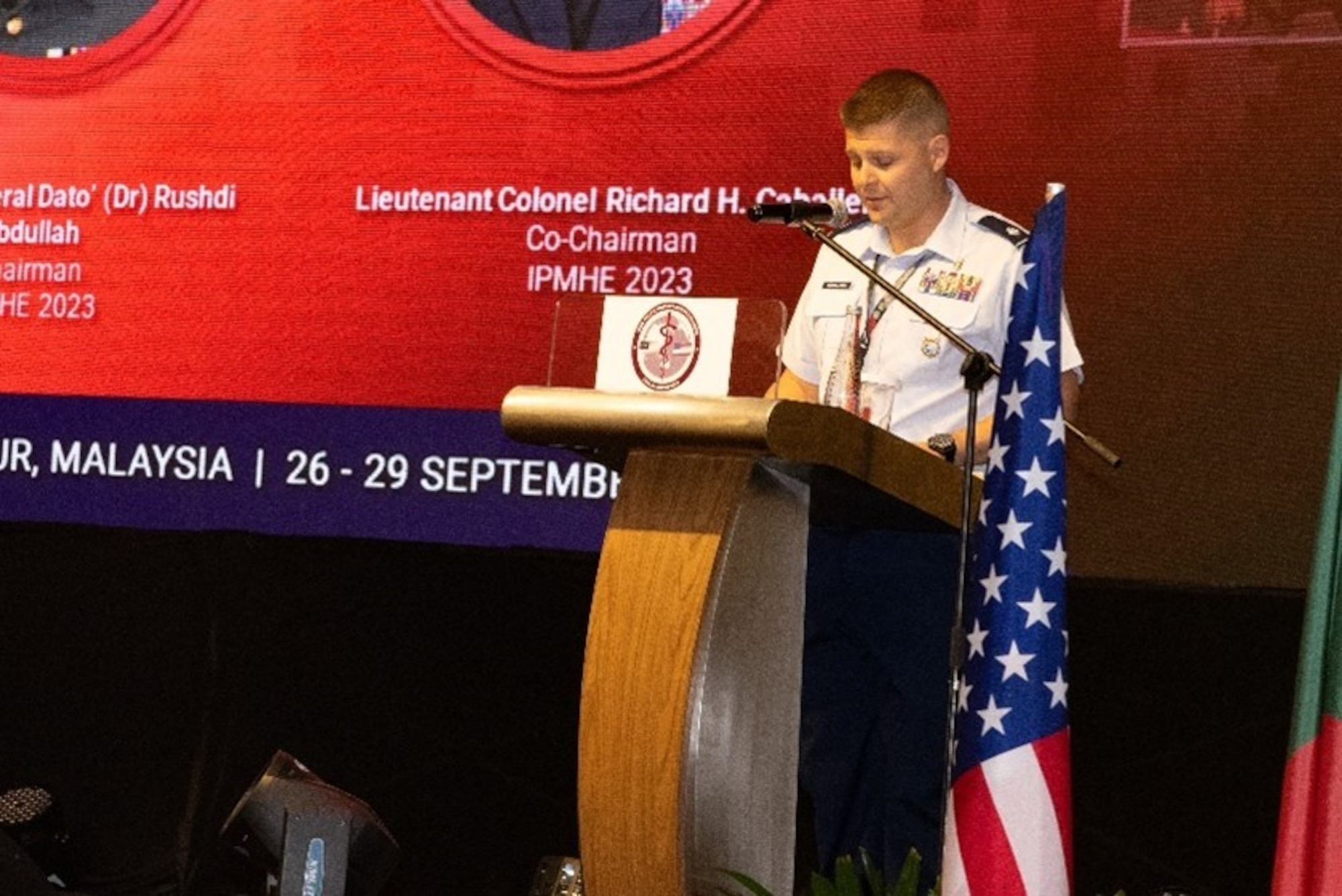 Image of service members giving a presentation.