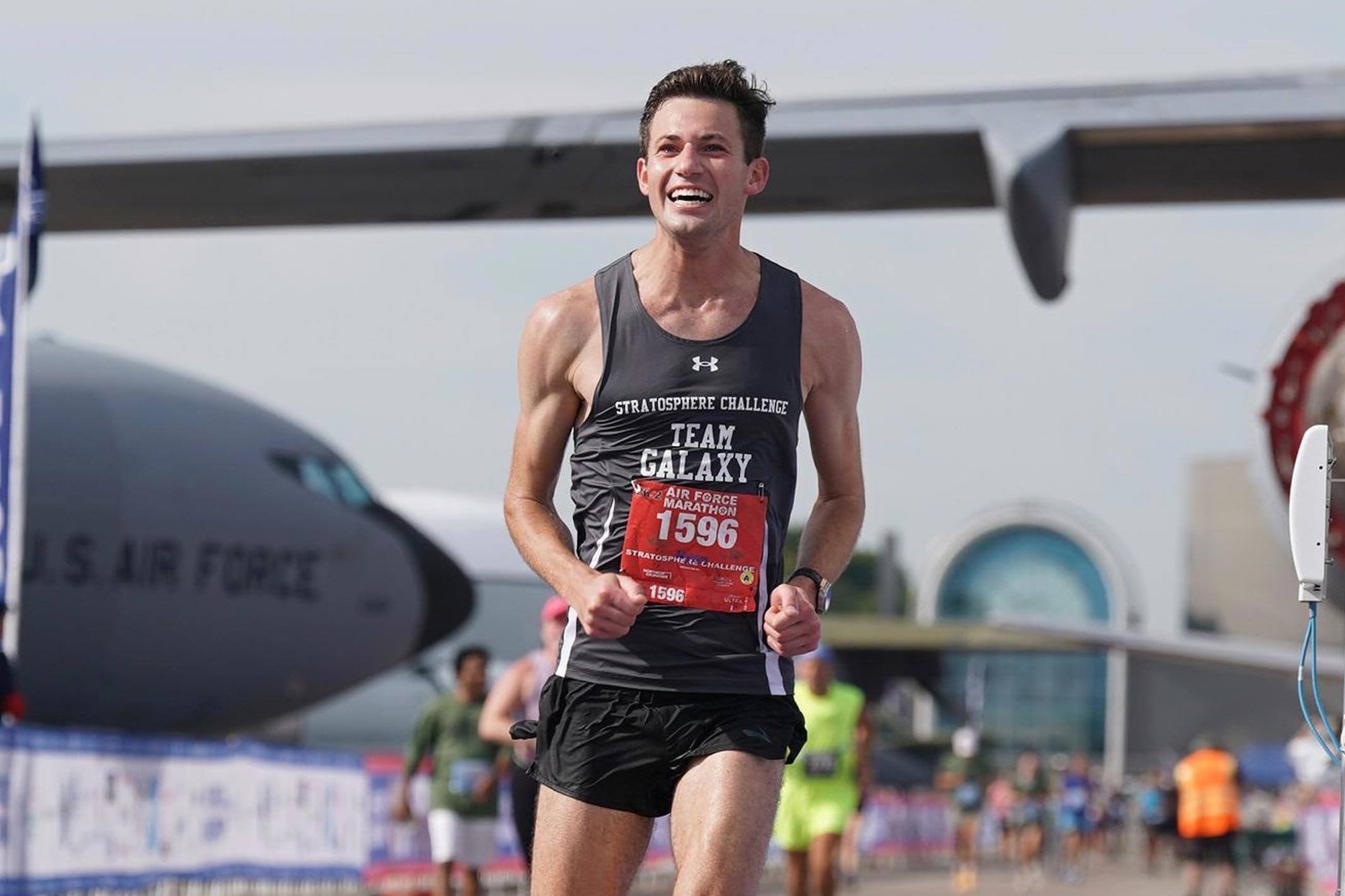 U.S. Space Force 1st Lt Ryan Kirk crosses the Air Force Marathon finish line on Wright-Patterson Air Force Base Sept. 16, 2023. Kirk was one of 50 athletes selected to compete on behalf of the Department of the Air Force Sports program, crossing the finish line at 2:57:14.