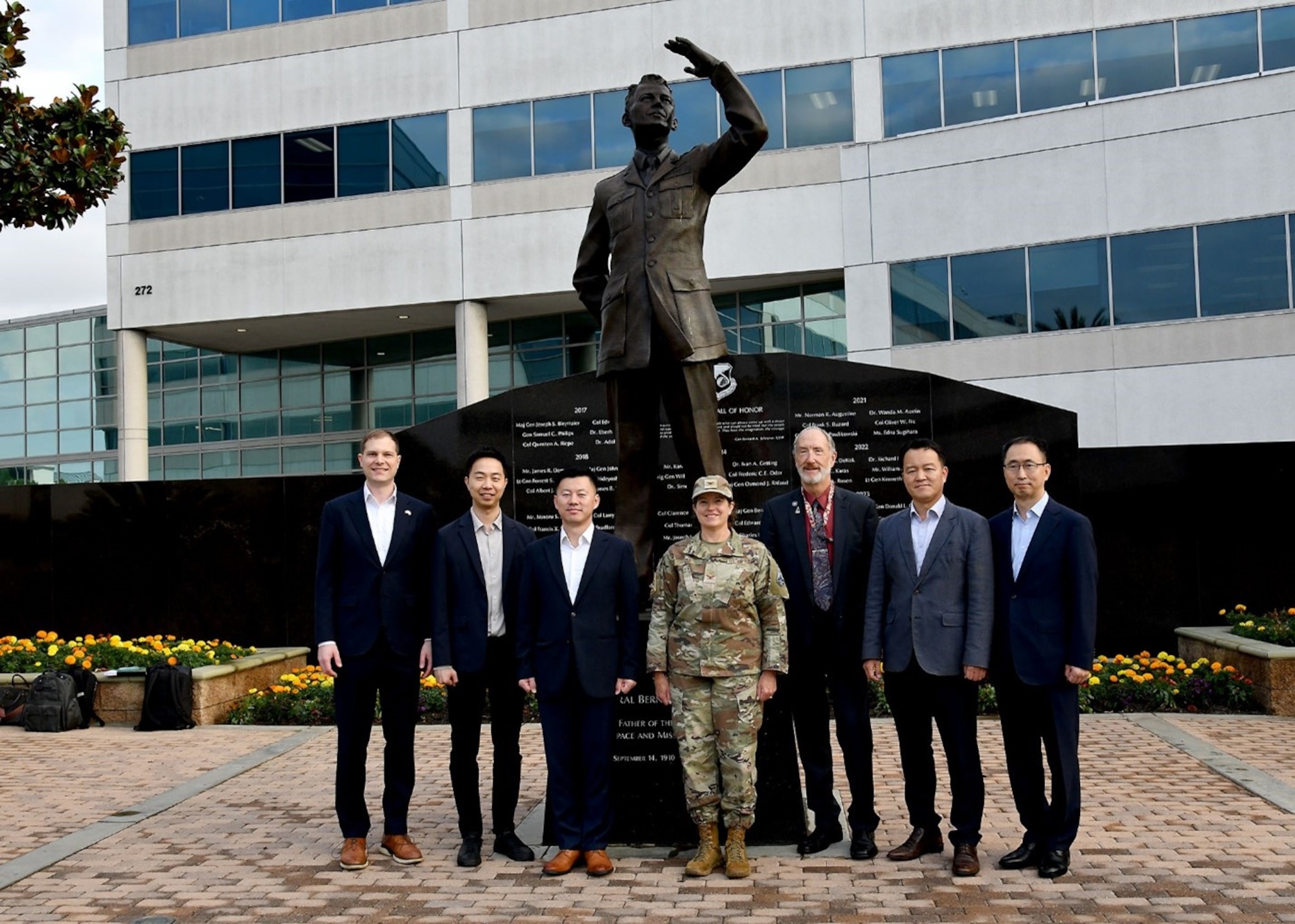 Members of the Korean Defense Acquisition Program Administration (DAPA) (from left to right) Lt. Col. Matt Getts, JUSMAG-Korea, Mr. Yongjun Noh, senior deputy director Satellite Program, Col. Hyunjin Park, DPA R&D Program team lead, Col. Michelle Idle, mobilization assistant to the commander, SSC, Dr. Steve Pluntze, executive director, SSC International Affairs  Office, Lt. Col. Jaeyong Lee, Satellite Program manager, and Mr. Hyunjong Kim, specialized official for the Satellite Program Management Office, during a visit to SSC Sept. 20-21. This was the first time a delegation from the Republic of Korea has visited SSC. (Photo by Jose Lou Hernandez, SSC)