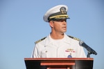 Naval Base San Diego Commanding Officer Captain Robert Heely speaks to the participants during the Opening Ceremony of the 14th Edition of the Conseil International du Sport Militaire (CISM) World Military Golf Championship held at the Admiral Baker Golf Course in San Diego, Calif., hosted by Naval Base San Diego, Calif.  Nations from Bahrain, Canada, Denmark, Dominican Republic, Estonia, France, Germany, Ireland, Italy, Kazakhstan, Kenya, Latvia, Netherlands, Sri Lanka, Tanzania, Zimbabwe, and host USA compete for gold. Department of Defense Courtesy Photo by Mr. Richard Valentine - Released.