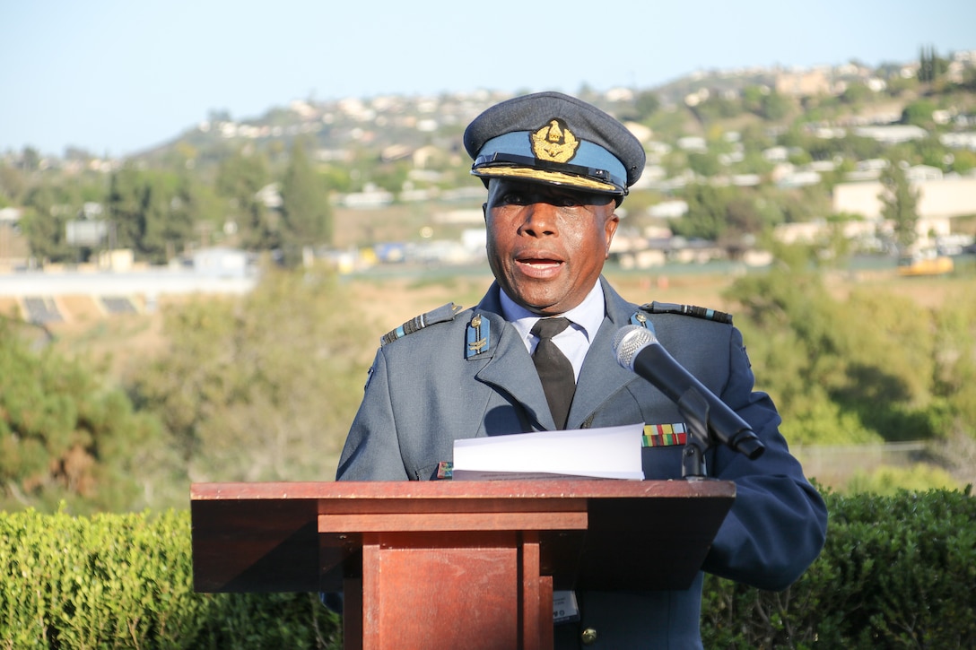 Zimbabwean Air Vice Marshall Simon Nyowani, the Official CISM (International Military Sports Council) Representative, addresses the crowd during the opening ceremony of the 14th CISM World Military Golf Championship held at the Admiral Baker Golf Course in San Diego, Calif., hosted by Naval Base San Diego, Calif.  Nations from Bahrain, Canada, Denmark, Dominican Republic, Estonia, France, Germany, Ireland, Italy, Kazakhstan, Kenya, Latvia, Netherlands, Sri Lanka, Tanzania, Zimbabwe, and host USA compete for gold. Department of Defense Courtesy Photo by Mr. Richard Valentine - Released.