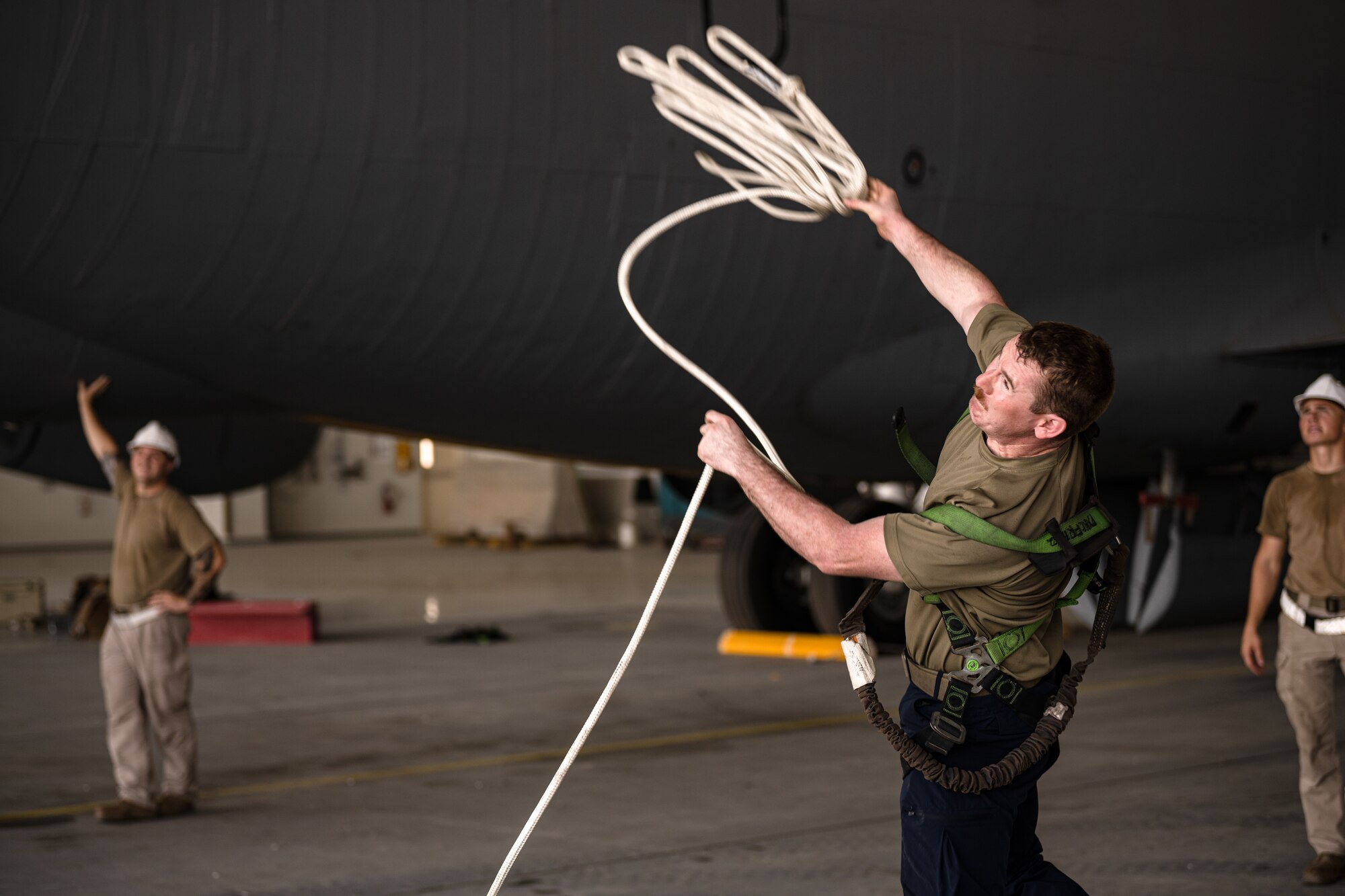 Airman tossing a rope
