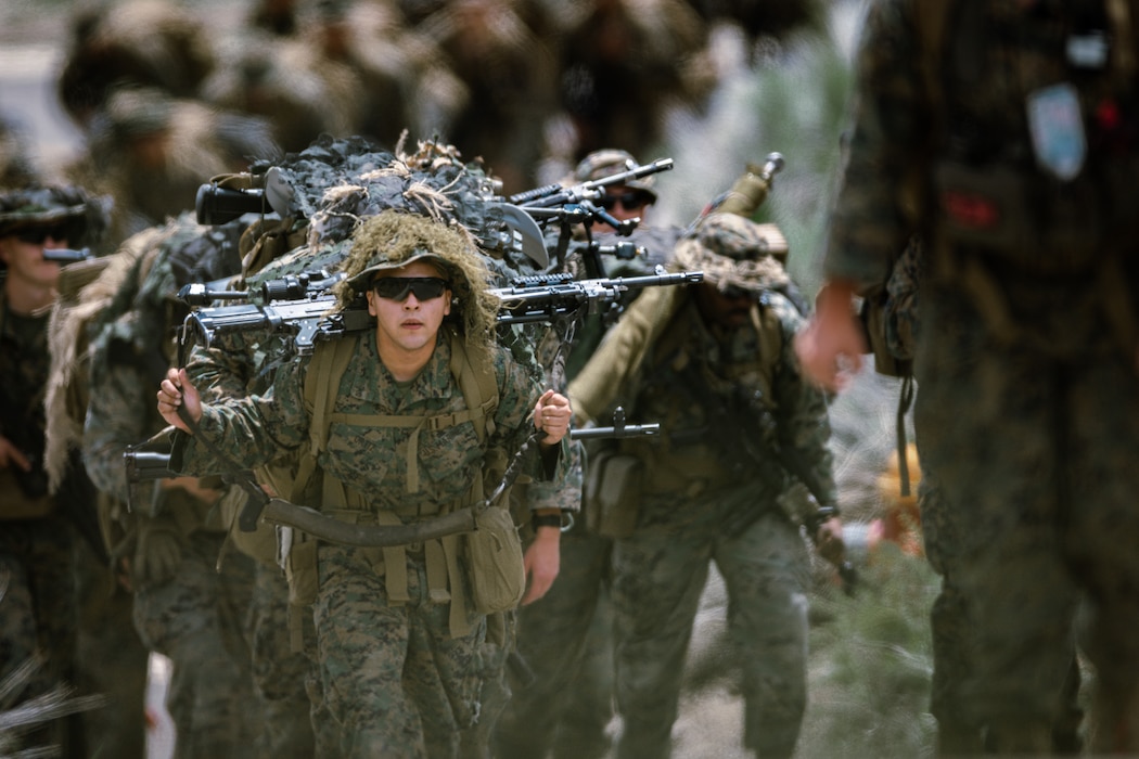 U.S. Marines with 2/23 conduct a conditioning hike during Mountain Exercise 4-23