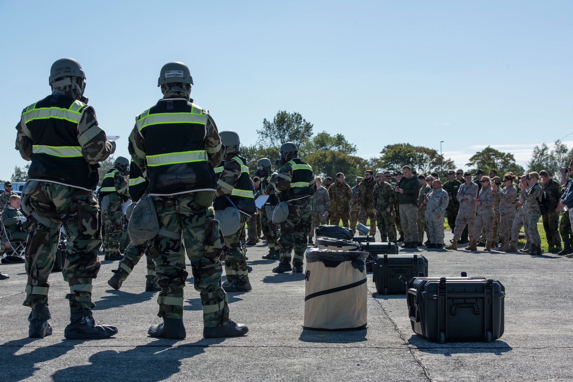 AFE Airmen wait for airmen in other NATO nations air forces to process through a decontamination line