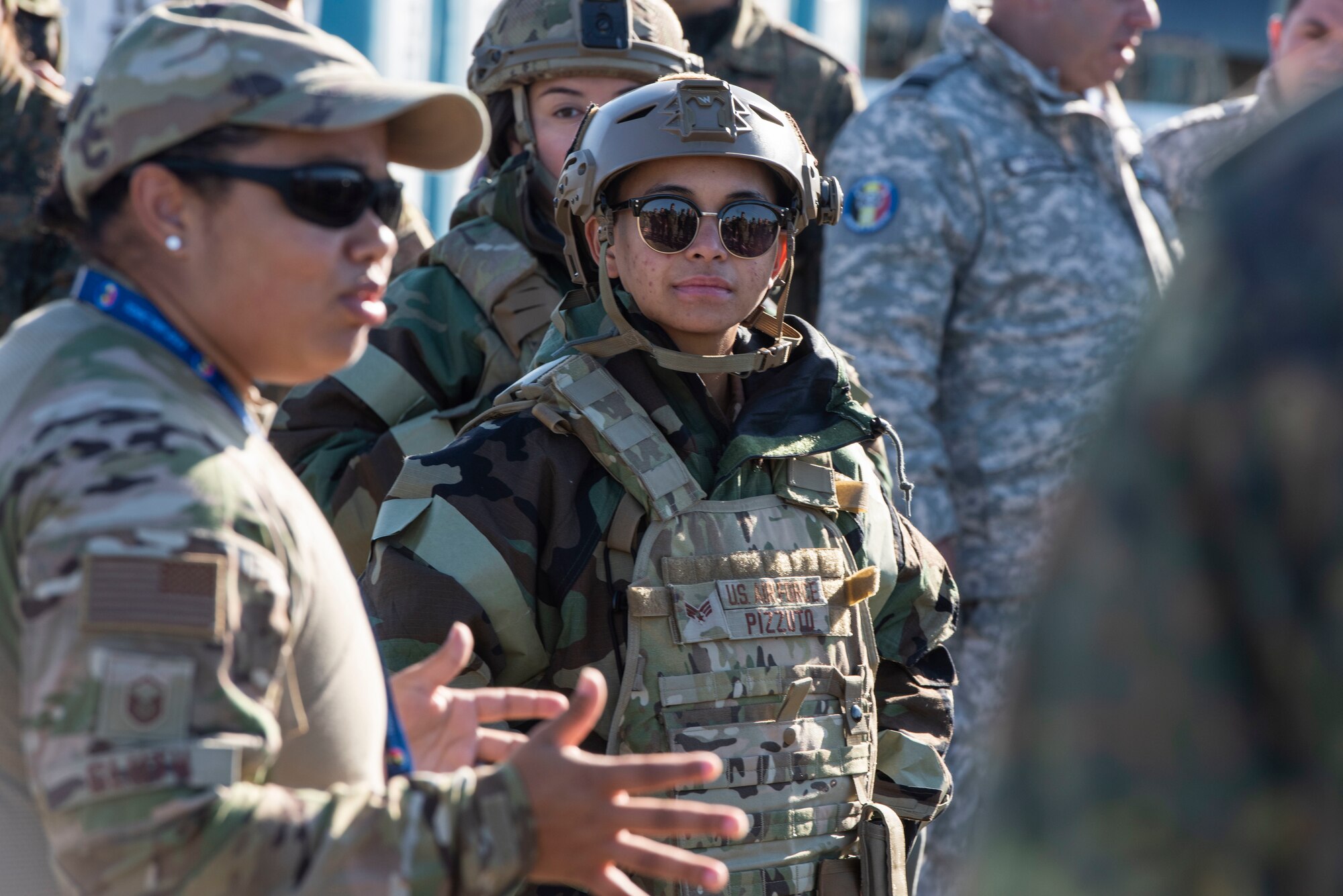 A woman explains CBRN processes to an audience