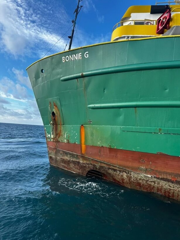 Photo of the cargo vessel Bonnie G aground, approximately half a nautical mile south of the Cyril E. King airport in the U.S. Virgin Islands Oct. 5, 2023.  Coast Guard response personnel at the scene reported the Bonnie G. appeared to be stable and no visible signs of oil pollution or an active fuel discharge. An Incident Command has been established at Marine Safety Detachment St. Thomas and at Coast Guard Base San Juan to oversee response efforts in this case. (U.S. Coast Guard photo)
