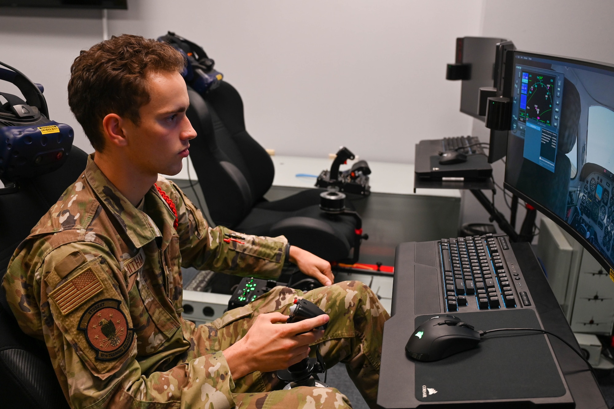 U.S. Air Force Airman 1st Class Daniel Whitman, 97th Training Squadron boom operator student, utilizes a virtual reality pilot simulator in the virtual reality cafe at Altus Air Force Base
(AFB), Oklahoma, Sept. 27, 2023. The 97th Training Squadron has managed to hit a 16 year high in graduating aircrew that come through Altus AFB. (U.S. Air Force photo by Airman 1st Class Kari Degraffenreed)