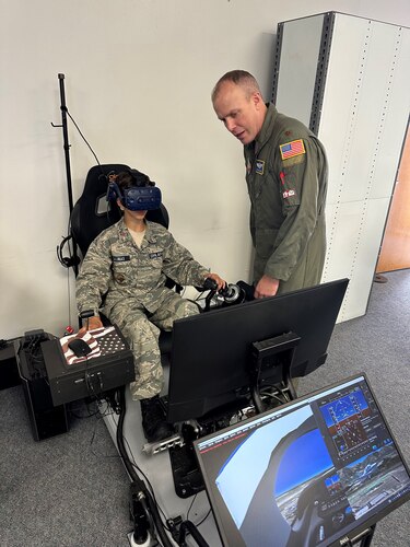 Maj. Steve Latham instructs a Civil Air Patrol cadet at a virtual reality lab. (Courtesy photo)