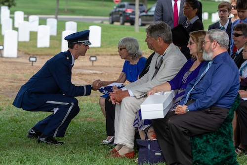 Air Force Reserve Chaplain (Maj.) Steven Rein thanks family members during a funeral service at Arlington National Cemetery (Courtesy photo)