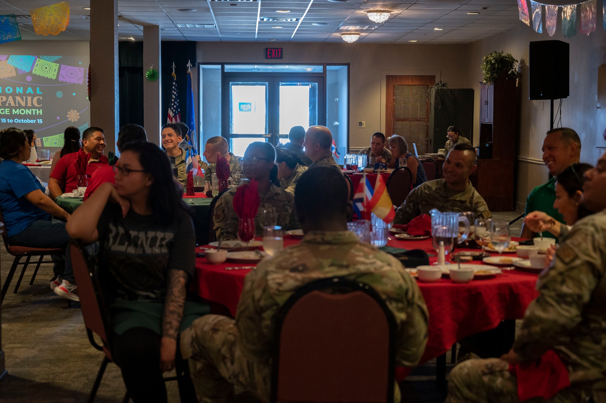 Members of Laughlin AFB are served Hispanic and Latino food and conversate  during a Hispanic Heritage Month luncheon held at Laughlin Air Force Base, Texas, Sept. 29, 2023. Airmen were invited to attend the Hispanic Heritage Month luncheon to learn more about their peers of Hispanic and Latino culture and their experiences in the Air Force. (U.S. Air Force photo by Airman 1st Class Kailee Reynolds)