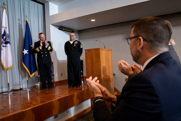 Information Systems Technician Second Class (IT2) Thomas James, Defense Intelligence Agency, receives the Navy and Marine Corps Medal at a ceremony on Peterson Space Force Base, Colo., Oct. 5, 2023.