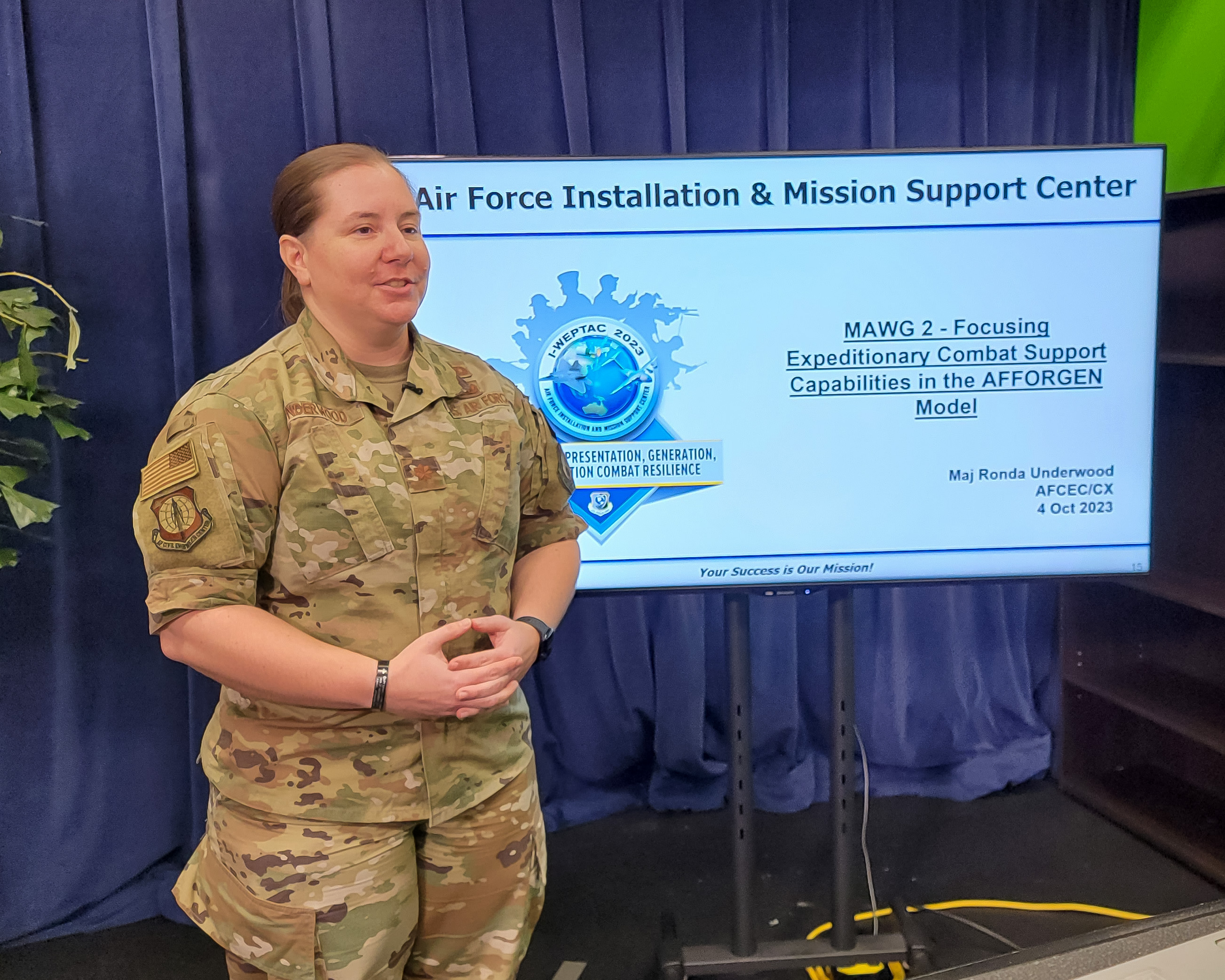 Maj. Ronda Underwood, chief of the Air Force Civil Engineer Center’s Expeditionary Engineering Division, Tyndall Air Force Base, Florida, presents at this year’s Installation and Mission Support Weapons and Tactics Conference at Joint Base San Antonio-Lackland, Texas, Oct. 4, 2023. Underwood was the chairperson for Mission Area Working Group 2, which was tasked with finding a solution for the topic “Focusing Expeditionary Combat Support Capabilities in the AFFORGEN Deployment Model.” Hosted by the Air Force Installation and Mission Support Center, I-WEPTAC is an annual innovation forum that leverages the expertise of Airmen and Guardians on cross-functional teams that study and develop courses of action to solve agile combat support challenges. (U.S. Air Force photo by Malcolm McClendon).