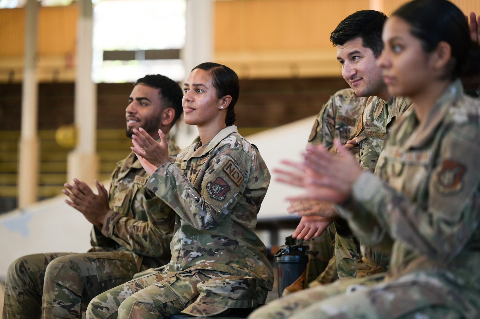 Airmen assigned to the 15th Wing and the 647th Air Base Group attend a mental health brief at Joint Base Pearl Harbor-Hickam, Hawaii, Oct. 4, 2023. The event was held to give Airmen the opportunity to be exposed to scenarios that they or someone they know could face in the future, enhancing their mental wellness. (U.S. Air Force photo by Staff Sgt. Alan Ricker)