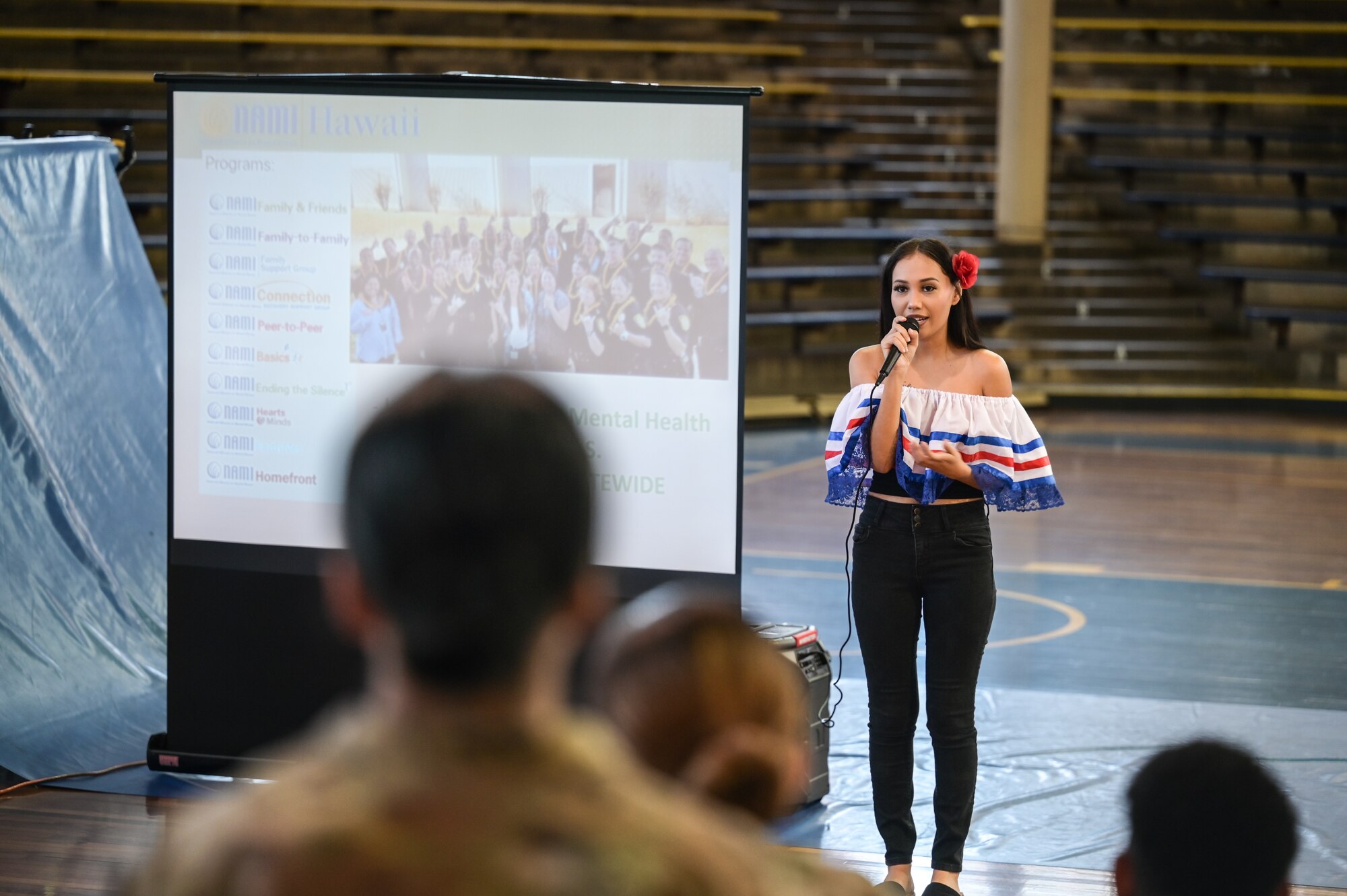 Asianna Sragosa-Torres, mental health advocate, speaks to 15th Wing and 647th Air Base Group Airmen during a mental health brief at Joint Base Pearl Harbor-Hickam, Hawaii, Oct. 4. 2023. The event was held to give Airmen the opportunity to be exposed to scenarios that they or someone they know could face in the future, enhancing their mental wellness. (U.S. Air Force photo by Staff Sgt. Alan Ricker)