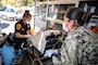 231004-N-TC847-1030 SAN FRANCISCO (Oct. 4, 2023) Boatswain's Mate 1st Class Marabel Salazar, assigned to the San Antonio-class amphibious assault transport dock ship USS John P. Murtha (LPD 26), observes a paramedic with San Francisco Fire Department provide patient care during a ride along for a joint training exercise for San Francisco Fleet week 2023, Oct. 4, 2023. SFFW is an opportunity for the American public to meet the Navy, Marine Corps and Coast Guard teams and experience America's sea services. During Fleet week, service members participate in various community service events, showcase capabilities and equipment to the community, and enjoy the hospitality of the city and its surrounding areas. (U.S. Navy photo by Mass Communication Specialist 2nd Class Christine Montgomery/Released)