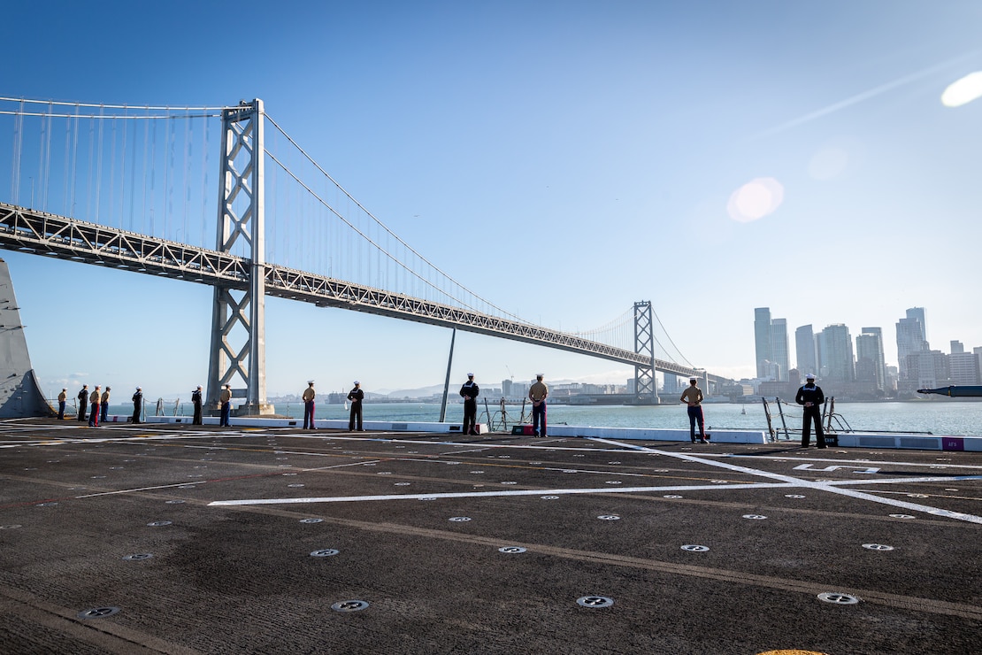 U.S. Marines and Sailors aboard the USS John P. Murtha (LPD 26) man the rails as part of San Francisco Fleet Week (SFFW) 2023 in San Francisco Bay, San Francisco, Oct. 1, 2023. SFFW is an opportunity for the American public to meet their Navy, Marine Corps and Coast Guard teams and experience America's sea services. During fleet week, service members participate in various community service events, showcase capabilities and equipment to the community, and enjoy the hospitality of the city and its surrounding areas. (U.S. Marine Corps photo by Cpl. Trent A. Henry)