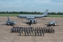 Service members from the Washington and Oregon Air National Guard stand alongside the Royal Thai Air Force members on Korat Air Base, Royal Kingdom of Thailand during the closing ceremony for the Enduring Partners engagement 2023, Sept. 21, 2023. Two weeks were spent collaborating and building a stronger relationship with the Royal Thai Air Force. (U.S. Air National Guard photo by Senior Airman Yuki Klein)