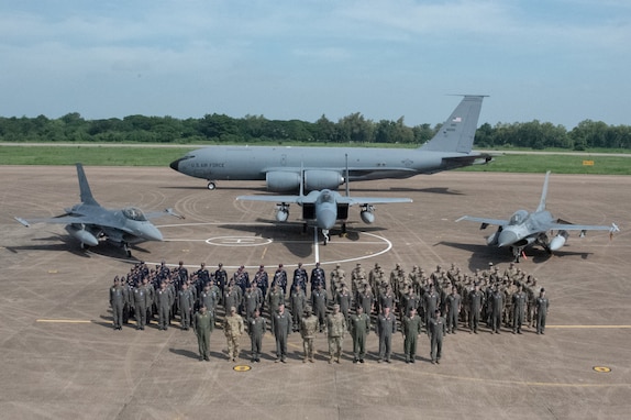 Service members from the Washington and Oregon Air National Guard stand alongside the Royal Thai Air Force members on Korat Air Base, Royal Kingdom of Thailand during the closing ceremony for the Enduring Partners engagement 2023, Sept. 21, 2023. Two weeks were spent collaborating and building a stronger relationship with the Royal Thai Air Force. (U.S. Air National Guard photo by Senior Airman Yuki Klein)