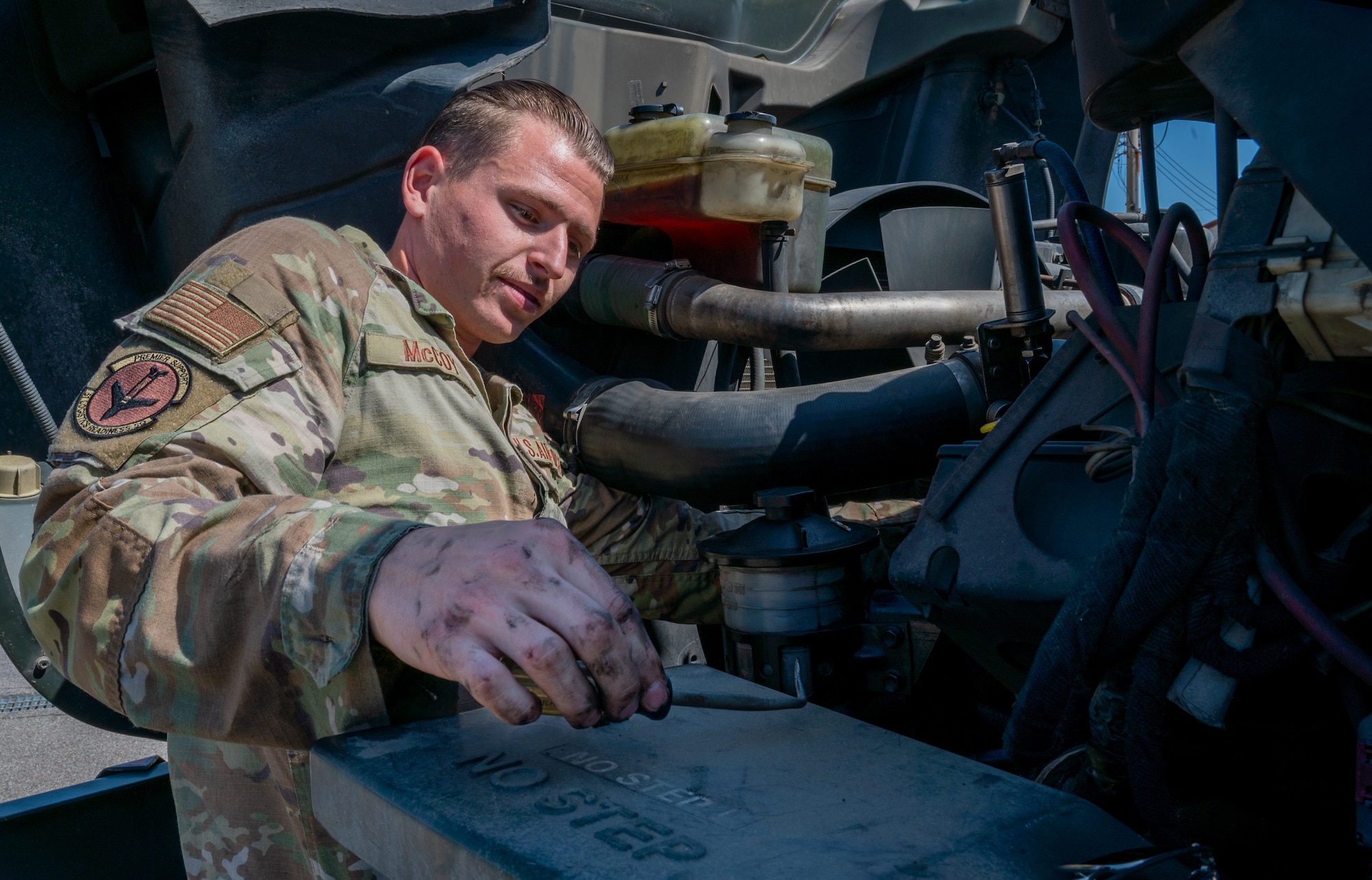U.S. Air Force Senior Airman Ryan McCoy, 51st Logistics Readiness Squadron noncommissioned officer in charge of refueling maintenance, performs routine maintenance on a vehicle at Osan Air Base, Republic of Korea, Sept. 8, 2023. R-11 refueling vehicles can deliver 6,000 gallons of fuel to aircraft which allows pilots to execute various aerial missions. Fleet vehicles such as refuelers go through a validation process every three to five years to ensure its utilization meets U.S. Air Force standards and continue to support the 51st Fighter Wing mission. (U.S. Air Force photo by Staff Sgt. Kelsea Caballero)