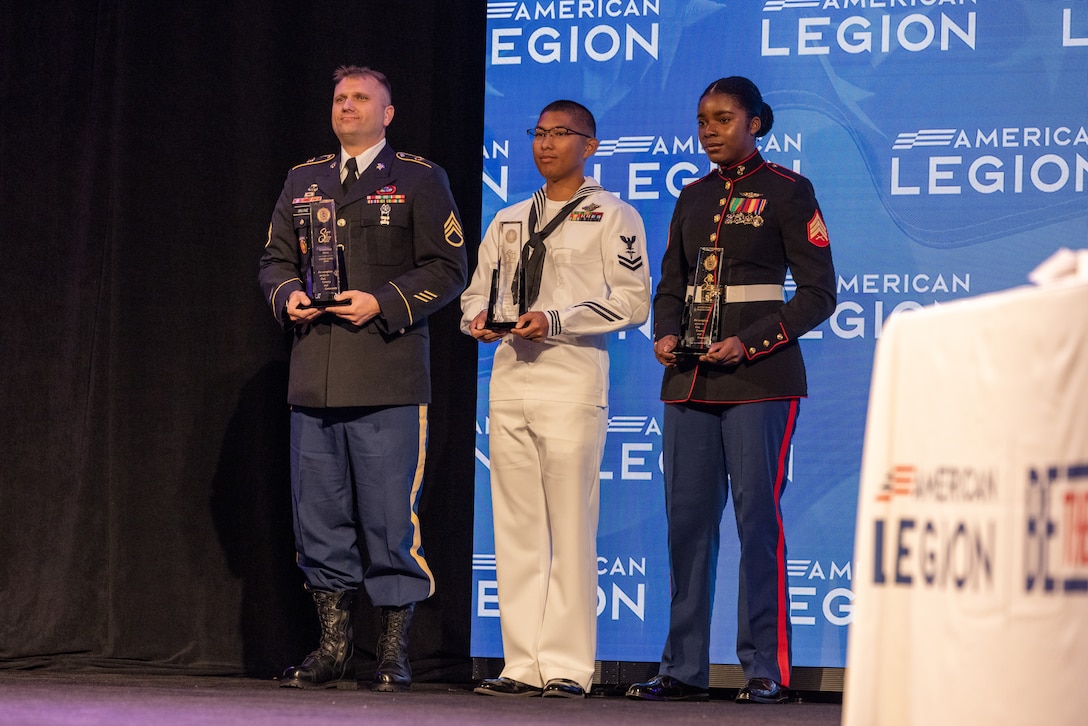 U.S. Marine Corps Sgt. Nhatalyne Bordes, a legal chief, office of the staff judge advocate, with Headquarters and Headquarters Squadron, Marine Corps Air Station New River, stands with other award recipients during the 104th American Legion National Convention in Charlotte, North Carolina, Aug. 29, 2023.  Bordes received the 2023 American Legion Spirit Service Award for the U.S. Marine Corps. (U.S. Marine Corps photo by Cpl. Jennifer E. Douds)