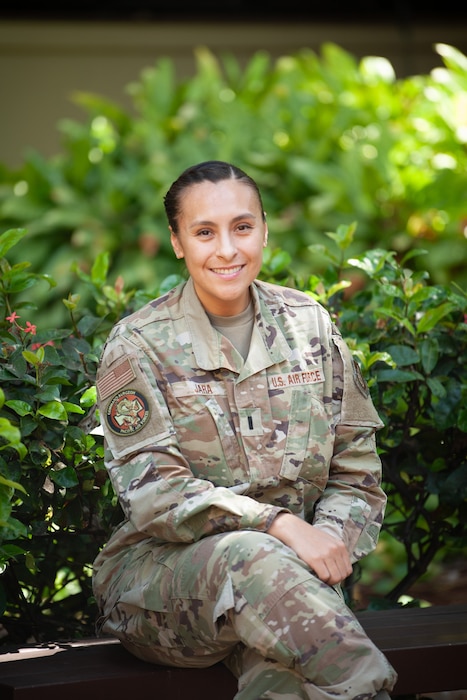 1st Lt. Antonieta Jara, 154th Medical Group public health officer, is seen at Joint Base Pearl Harbor-Hickam, Hawaii. At 17, Antonieta Jara embarked on a solo journey from Ecuador to the United States, carrying two suitcases and a dream. She overcame adversity, worked multiple jobs while pursuing a college degree, and eventually joined the Air Force as a public health technician. With the support of several mentors, the military and her family, she continued her education and became a commissioned officer after dedicating 14 years of uniformed service. (U.S. Air National Guard photo by Staff Sgt. John Linzmeier)