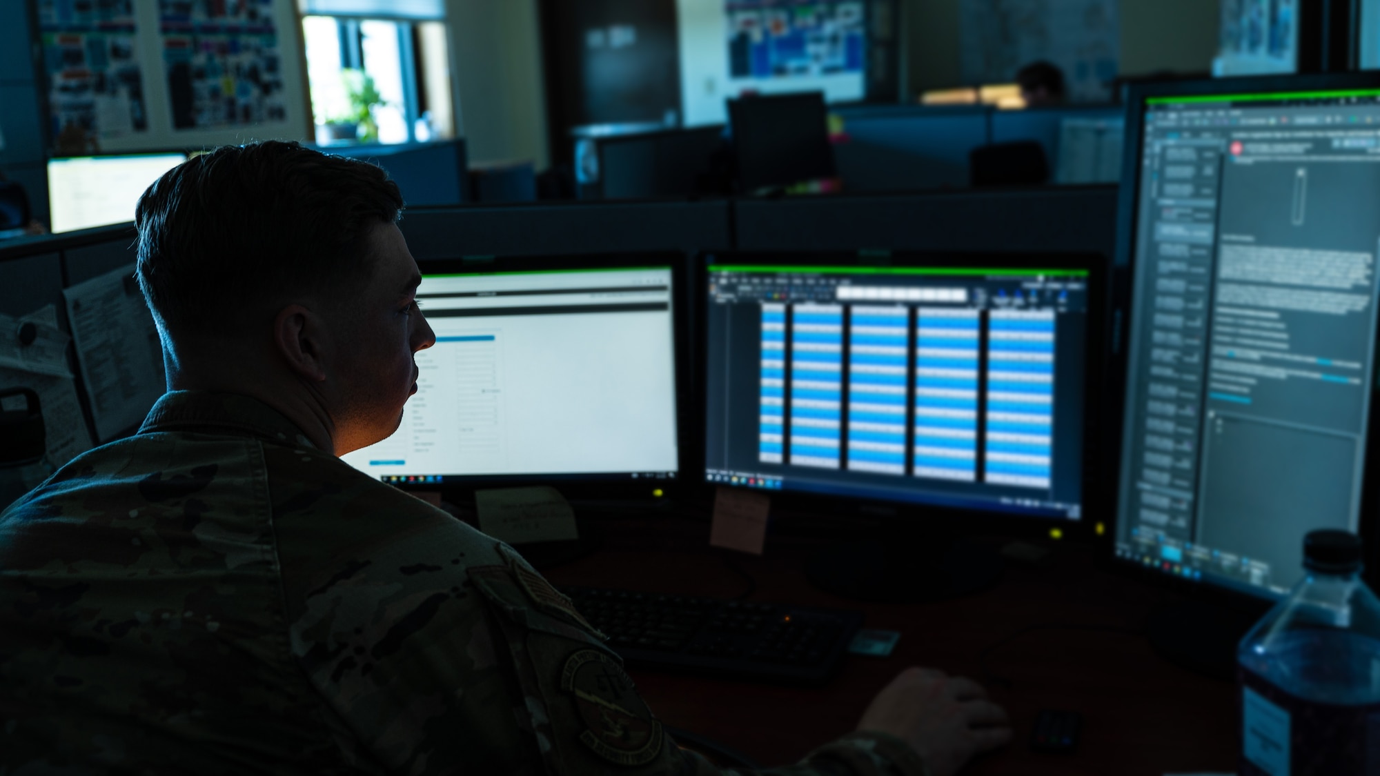Senior Airman Ryan Foley reviews case files through the Air Force Justice Information System.