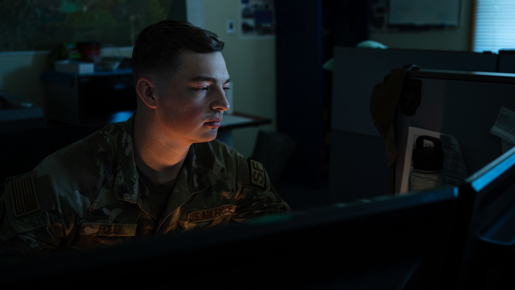 Senior Airman Ryan Foley reviews case files through the Air Force Justice Information System at Kunsan Air Base.
