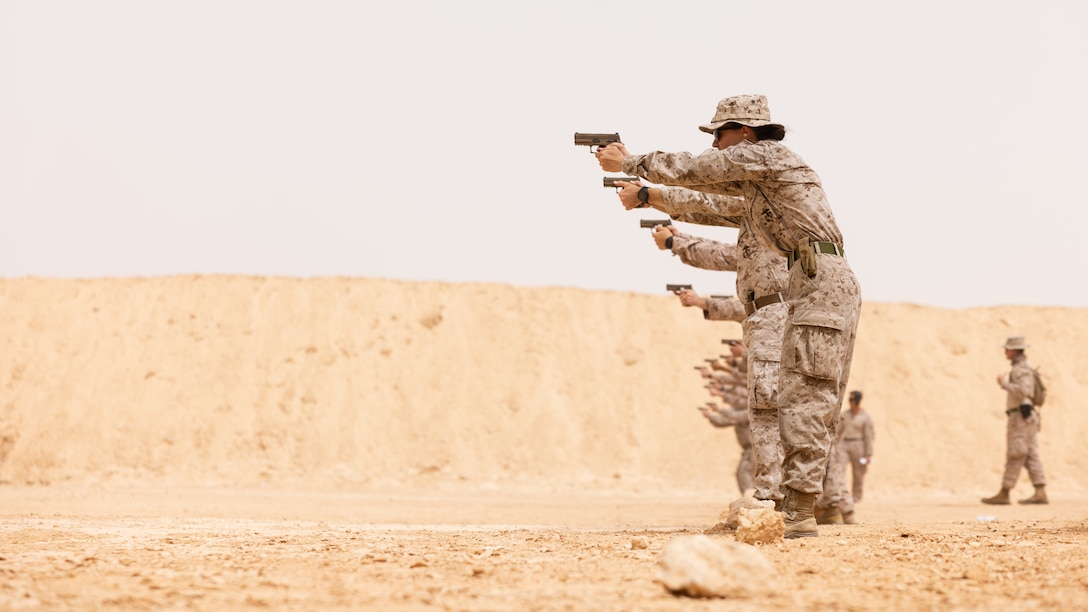 U.S. Marines with 3rd Assault Amphibian Battalion, 1st Marine Division, fire M18 Service Pistols while at a small arms range during Bright Star 23 at Menar El Wahesh, Egypt, Sep. 11, 2023. Bright Star 23 is a multilateral U.S. Central Command exercise held with the Arab Republic of Egypt across air, land, and sea domains that promotes and enhances regional security and cooperation, and improves interoperability in irregular warfare against hybrid threat scenarios.