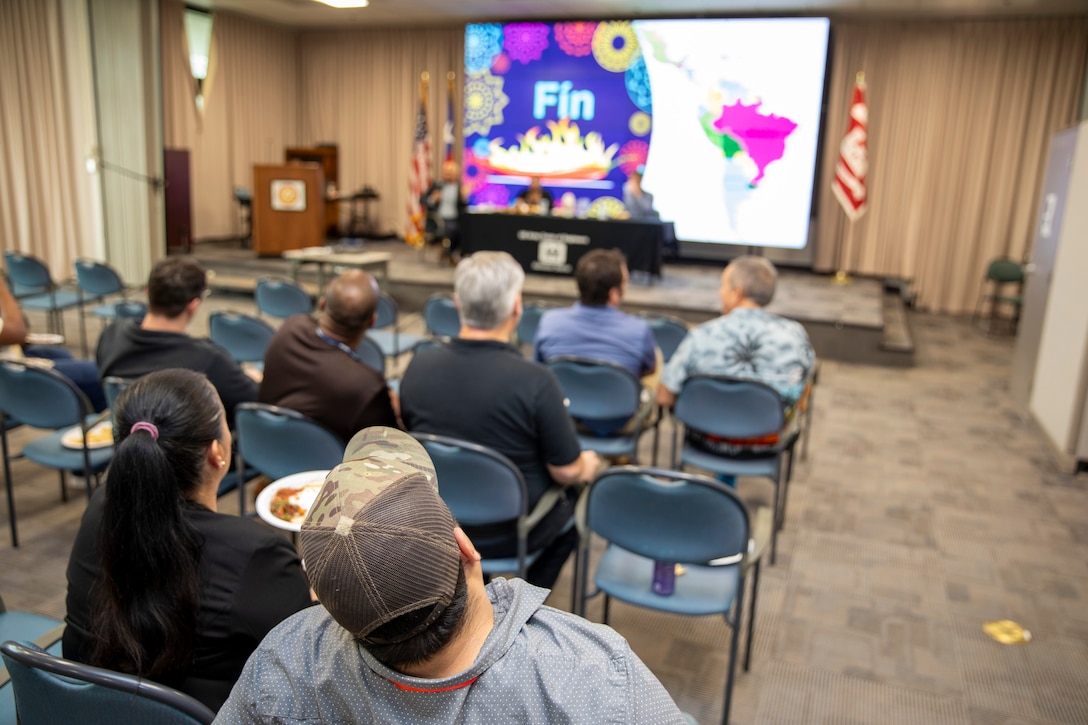 Members of the U.S. Army Corps of Engineers (USACE) Galveston District (SWG) sample a variety of homemade salsas and hot sauces during the district's Hispanic Heritage Month observance, October 5, 2023. SWG’s Hispanic Employment Program Manager Carlos Gomez and group of panelists presented ‘¡Caliente!: A presentation on the origins of spicy food’ to the attending audience and those tuning in remotely via WebEx.