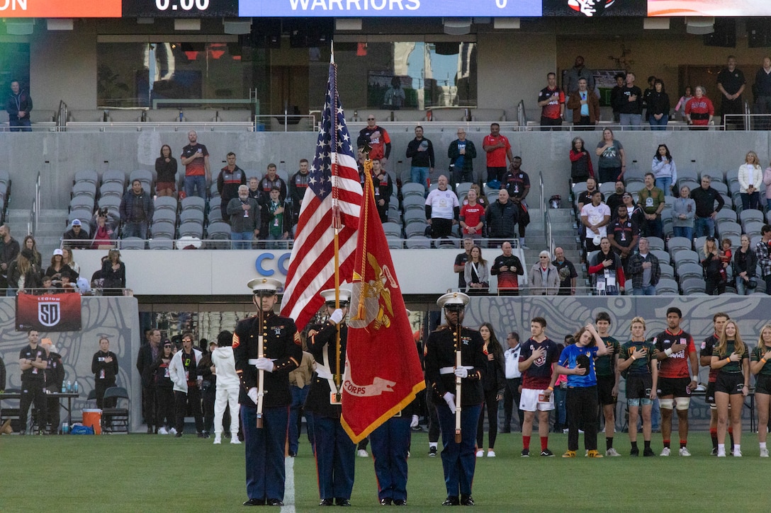 U.S. Marine Corps Color Guard presents the colors before a San Diego Legion rugby match at Snapdragon Stadium in San Diego, California on Feb. 18, 2023. The Marine Corps takes pride in paying tribute and respect to the nation's, and organizational colors. (U.S. Marine Corps photo by Cpl. Christian C. Bunch)