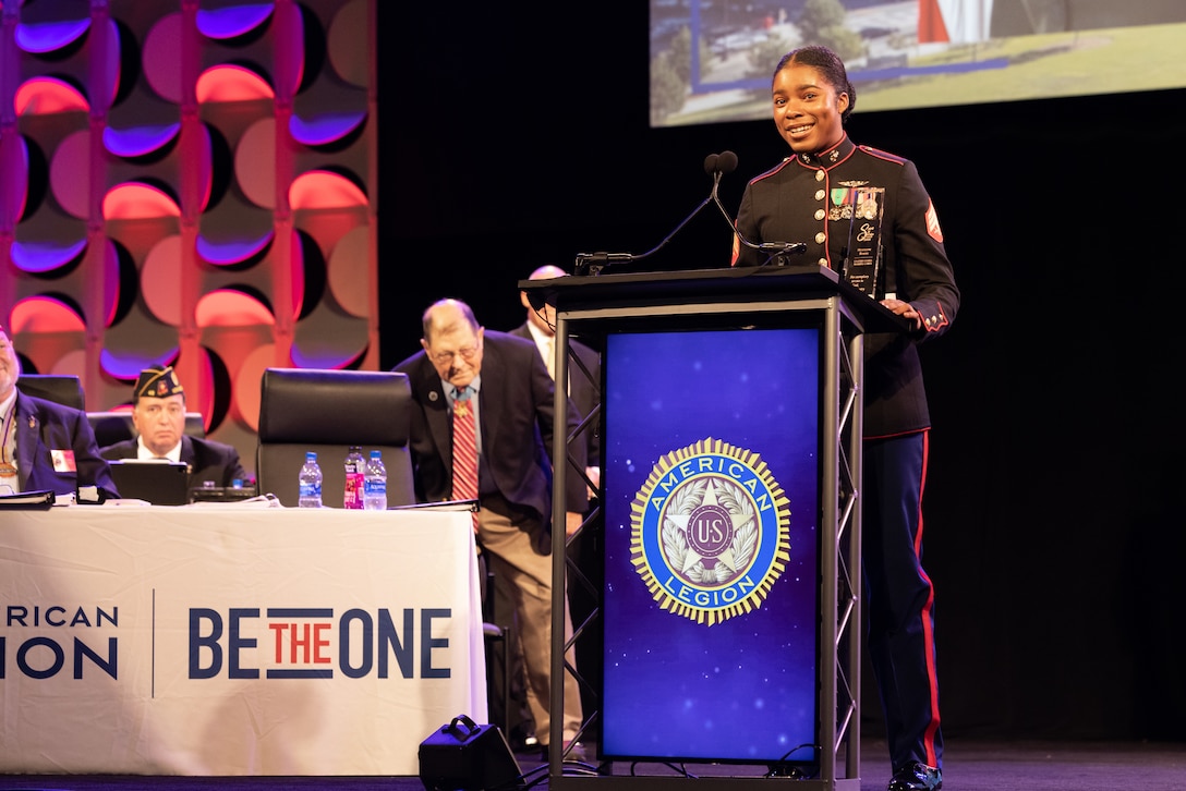 U.S. Marine Corps Sgt. Nhatalyne Bordes, a legal chief, office of the Staff Judge Advocate, with Headquarters and Headquarters Squadron, Marine Corps Air Station New River, gives a speech during the 104th American Legion National Convention in Charlotte, North Carolina, Aug. 29, 2023. Bordes received the 2023 American Legion Spirit Service Award for the U.S. Marine Corps. (U.S. Marine Corps photo by Cpl. Jennifer E. Douds)