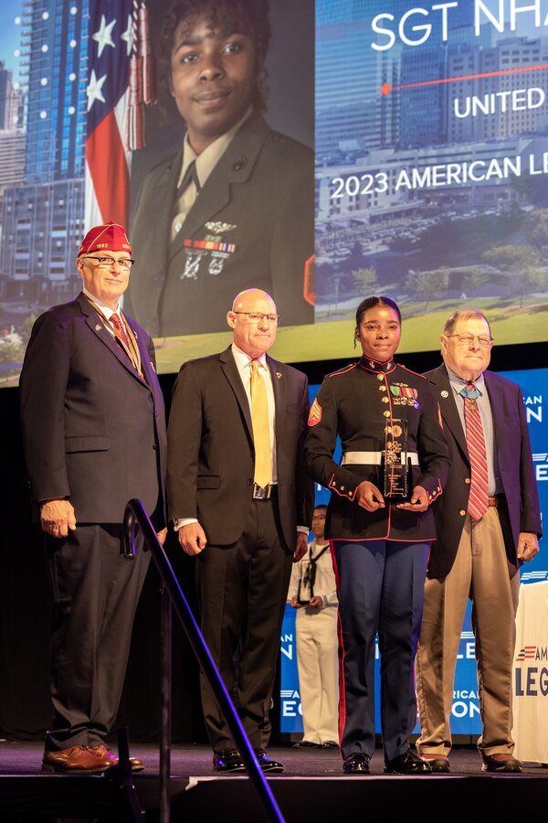 U.S. Marine Corps Sgt. Nhatalyne Bordes, a legal chief, office of the Staff Judge Advocate, with Headquarters and Headquarters Squadron, Marine Corps Air Station New River, poses for a photo during the 104th American Legion National Convention in Charlotte, North Carolina, Aug. 29, 2023. Bordes received the 2023 American Legion Spirit Service Award for the U.S. Marine Corps. (U.S. Marine Corps photo by Cpl. Jennifer E. Douds)