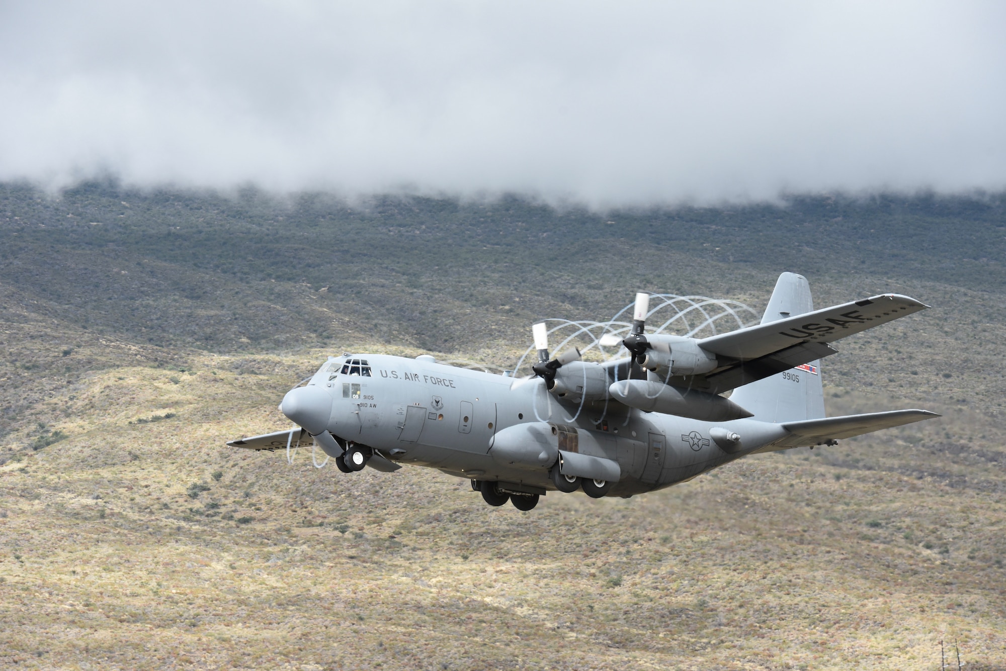 Air Force Reserve aircrews land at Bradshaw Army Airfield in a C-130H Hercules.