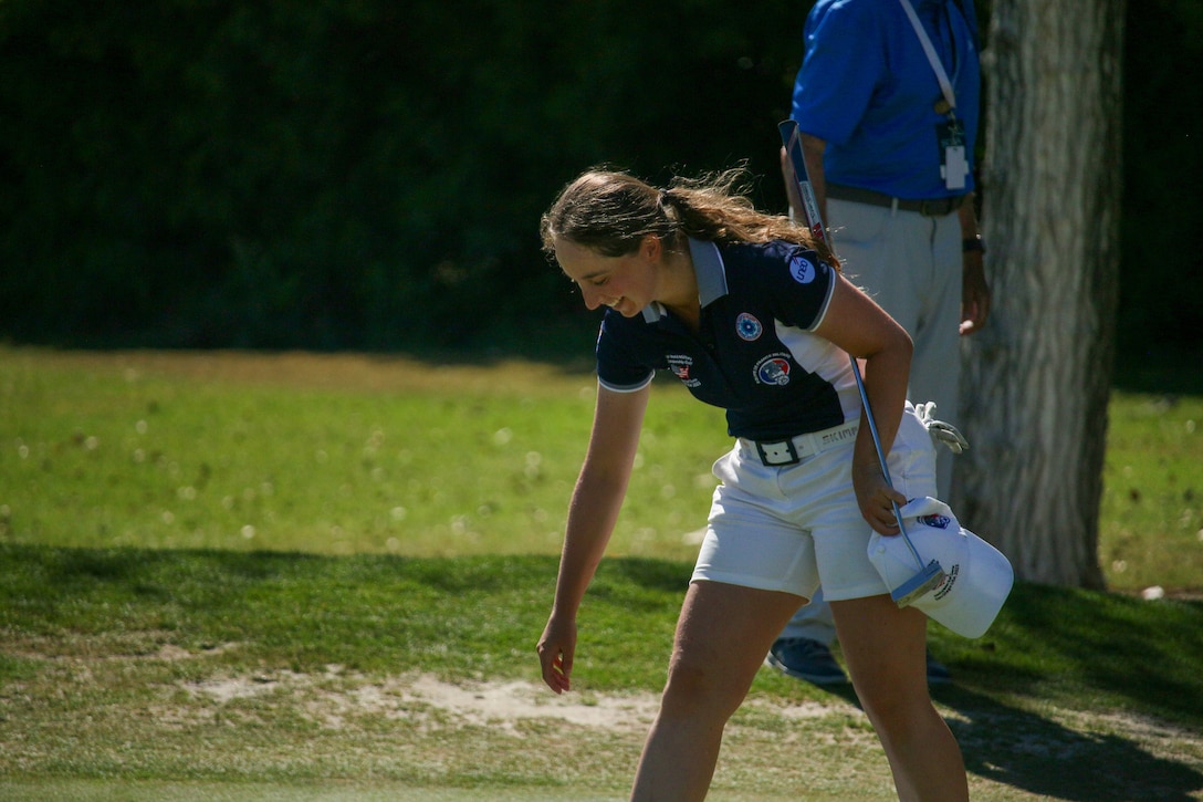 France's Pauline Stein smiles as she captures the women's gold medal at the 14th Edition of the Conseil International du Sport Militaire (CISM) World Military Golf Championship held at the Admiral Baker Golf Course in San Diego, Calif., hosted by Naval Base San Diego, Calif.  Nations from Bahrain, Canada, Denmark, Dominican Republic, Estonia, France, Germany, Ireland, Italy, Kazakhstan, Kenya, Latvia, Netherlands, Sri Lanka, Tanzania, Zimbabwe, and host USA compete for gold. Department of Defense Photo by Ms. Theresa Smith - Released.