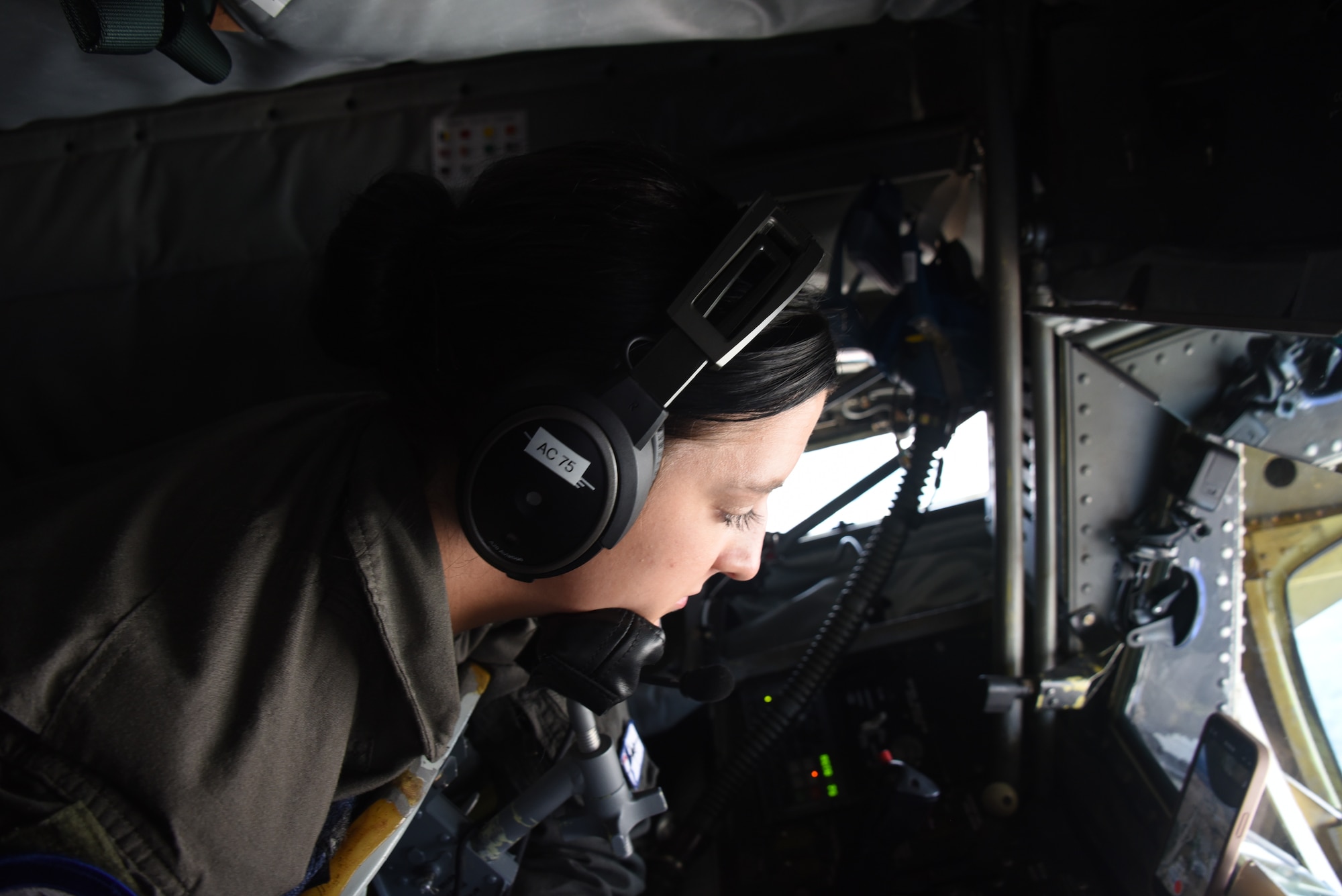 185th ARW Staff Sgt. Meleah Johnson lowers the boom of a KC-135 Stratotanker